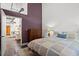 Comfortable bedroom featuring a queen bed and open doorway to the rest of the home at 659 Auburn Avenue Ne #219, Atlanta, GA 30312