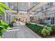 Exterior walkway with greenery and natural light creating a unique space at 659 Auburn Avenue Ne #219, Atlanta, GA 30312