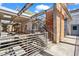 Unique urban apartment exterior showcasing metal stairs, brick accents, and covered walkways for a modern living experience at 659 Auburn Avenue Ne #219, Atlanta, GA 30312