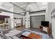 Bright living space with an open layout, stainless steel appliances, and concrete floors at 659 Auburn Avenue Ne #219, Atlanta, GA 30312