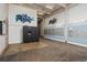 Modern lobby with secure Luxer package system, mailboxes, and artwork, providing convenience and security for residents at 659 Auburn Avenue Ne #219, Atlanta, GA 30312