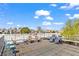 Spacious rooftop deck with chairs and tables, perfect for relaxing and enjoying panoramic neighborhood views at 659 Auburn Avenue Ne #219, Atlanta, GA 30312