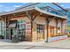 Street-level shop with outdoor seating, display windows and bike rack, creating an inviting and functional space at 659 Auburn Avenue Ne #219, Atlanta, GA 30312