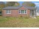 Charming brick home featuring a screened-in porch, perfect for enjoying the outdoors at 854 Slaton St, Forest Park, GA 30297