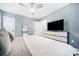 Primary bedroom boasts a ceiling fan, natural light and neutral decor at 1780 John Calvin Ave, Atlanta, GA 30337