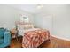 Cozy bedroom with hardwood floors and comfortable bed with a decorative blanket at 1780 John Calvin Ave, Atlanta, GA 30337