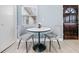 Cozy breakfast nook with table for two, natural light from the window at 1780 John Calvin Ave, Atlanta, GA 30337