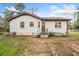 Charming single story home features a brick exterior, covered entry, and a well-maintained yard at 1780 John Calvin Ave, Atlanta, GA 30337