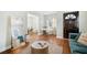 Inviting living room with hardwood floors, modern furniture, and lots of natural light at 1780 John Calvin Ave, Atlanta, GA 30337