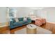Open living space showcasing hardwood floors, and a comfortable seating area at 1780 John Calvin Ave, Atlanta, GA 30337
