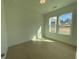 Sunlit bedroom with hardwood floors, large windows, and a serene atmosphere at 2155 Suncrest Point, Marietta, GA 30064