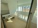 Open-concept living area with lots of windows and an eat-in kitchen island at 2155 Suncrest Point, Marietta, GA 30064