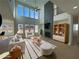 Stylishly decorated living room with large windows, a fireplace, and vaulted ceilings at 2155 Suncrest Point, Marietta, GA 30064