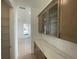 Chic pantry with glass-door cabinets and light countertops provides ample storage and style at 2155 Suncrest Point, Marietta, GA 30064