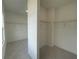 Spacious walk-in closet with ample shelving and room for customized organization systems at 2155 Suncrest Point, Marietta, GA 30064