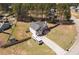 Aerial shot of a home with a large yard, fence, and driveway long enough to accommodate a trailer at 248 Christian Circle, Carrollton, GA 30116