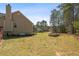 Expansive backyard with ample space and privacy provided by mature trees at 248 Christian Circle, Carrollton, GA 30116