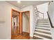 Bright entryway with hardwood floors and staircase leading upstairs at 4983 Odins Way, Marietta, GA 30068
