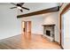Living room with stone fireplace and access to outdoor deck at 4983 Odins Way, Marietta, GA 30068