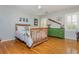 Comfortable bedroom with hardwood floors, bright windows, and plenty of natural light at 730 Denmead Se Ml, Marietta, GA 30067