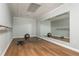 Home gym with ballet bar, workout mat, and large mirror at 730 Denmead Se Ml, Marietta, GA 30067