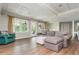Finished basement with hardwood floors, recessed lighting, and neutral walls at 730 Denmead Se Ml, Marietta, GA 30067