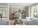 Elegant living room with a neutral color palette, lots of natural light, and stylish decor for comfortable living at 730 Denmead Se Ml, Marietta, GA 30067