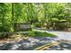 Community entrance, surrounded by natural beauty in a peaceful setting at 730 Denmead Se Ml, Marietta, GA 30067