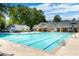 Relaxing swimming pool with clear blue water and a well-maintained pool area for residents' enjoyment at 730 Denmead Se Ml, Marietta, GA 30067