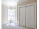 Cozy bedroom featuring a bright bay window and a large closet at 3055 Alston Dr, Decatur, GA 30032