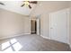 Bedroom with vaulted ceiling, ceiling fan, and neutral carpet at 3055 Alston Dr, Decatur, GA 30032
