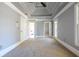 Spacious bedroom boasting coffered ceilings, soft carpet and multiple doorways at 3055 Alston Dr, Decatur, GA 30032