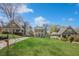 Charming home with a well-manicured lawn, a tree, and inviting curb appeal at 3055 Alston Dr, Decatur, GA 30032