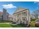Beautiful two-story home featuring a covered porch, detailed trim, and a well-kept lawn at 3055 Alston Dr, Decatur, GA 30032