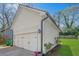 Detached garage with white siding and a paved driveway at 3055 Alston Dr, Decatur, GA 30032