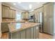 Well-equipped kitchen with an island, stainless steel appliances, and beautiful countertops at 3055 Alston Dr, Decatur, GA 30032