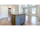 Kitchen island featuring seating, storage, and granite countertop at 3055 Alston Dr, Decatur, GA 30032