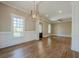 Bright, open living room featuring hardwood floors and large windows at 3055 Alston Dr, Decatur, GA 30032