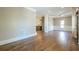 Open-concept living room with hardwood floors and view to the kitchen at 3055 Alston Dr, Decatur, GA 30032