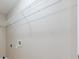 Room with a shelf. Includes hookups for a washer/dryer unit at 3055 Alston Dr, Decatur, GA 30032