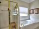 Bathroom featuring a tub, a shower and decorative wall art at 4103 Christacy Way, Marietta, GA 30066