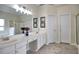 Bright bathroom featuring double sinks, white cabinets, and a large mirror at 4103 Christacy Way, Marietta, GA 30066