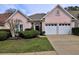 Charming home with a well-manicured lawn, a two-car garage, and an inviting facade, perfect for Gathering living at 4103 Christacy Way, Marietta, GA 30066