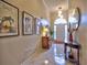 Bright and inviting foyer featuring tiled floors, an arched entry, and elegant decor at 4103 Christacy Way, Marietta, GA 30066