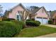 Charming single-story home featuring a well-manicured lawn, a two-car garage, and a welcoming entrance at 4103 Christacy Way, Marietta, GA 30066