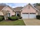 Charming single-story home featuring a well-manicured lawn, a two-car garage, and a welcoming entrance at 4103 Christacy Way, Marietta, GA 30066
