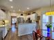 Well-lit kitchen with white cabinets, stainless steel appliances, and granite countertops, ready for culinary adventures at 4103 Christacy Way, Marietta, GA 30066