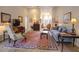 Comfortable living room featuring a blue sofa, area rug, and neutral paint, creating a welcoming atmosphere at 4103 Christacy Way, Marietta, GA 30066