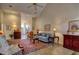 Inviting living room with high ceilings, ceiling fan, a large rug and an open entryway at 4103 Christacy Way, Marietta, GA 30066