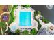 An aerial view of the community pool, a lake, green space, playground and a pavilion at 12350 Edenwilde Dr, Roswell, GA 30075